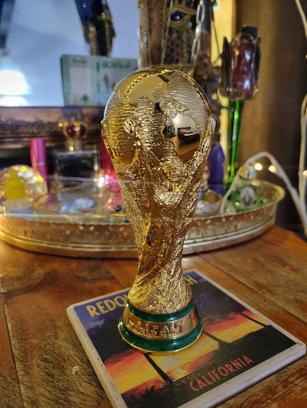 Gold World Cup Trophy Figurine with Green Base